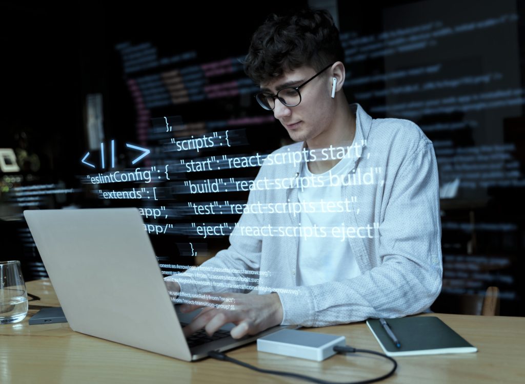 programming-background-with-person-working-with-codes-computer